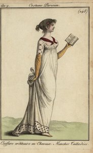 Fashionable woman reading a book