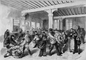 Paris, winter 1868: free distribution of clothing and bedding articles at the Mont de Piete thanks to the financial aid of Emperor Napoleon III. Engraving in "Le Monde Illustre" No. 563 of 25 January 1868. by French School