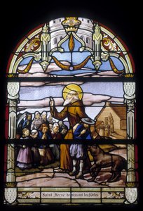 Saint Hervé blessing the faithful - stained glass windows of St Germain church in Kerlaz by French School