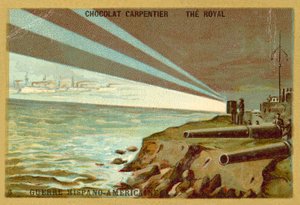 Searchlights from a shore battery illuminating a fleet of warships, Spanish-American War
