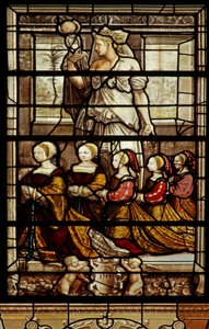 The Chapel north window: St Agatha with Anne de Montmorency