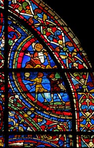 The Prodigal Son window: butlers serve the meal; an angel by French School