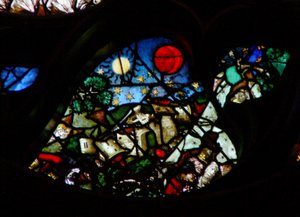 The west rose window depicting a scene from the Book of Revelation: Opening the sixth seal: The great day of his wrath; the ruin created by earthquakes, the sun with a black sackcloth of hair