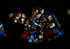 The west rose window depicting a scene from the Book of Revelation: Seven angels before God being given seven trumpets by French School