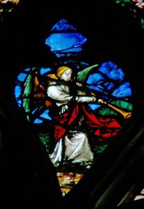 The west rose window depicting a scene from the Book of Revelation: Sixth trumpet