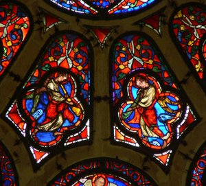 Window depicting an angel blowing the Last Judgement trumpet by French School