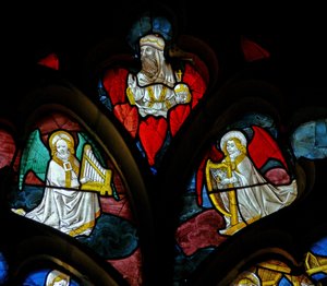 Window depicting musical angels and God by French School