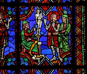 Window depicting St Julian of Brioude story - St Ferreol, a friend of Julien, who died during the Diocletian persecutions, forced to worship idols