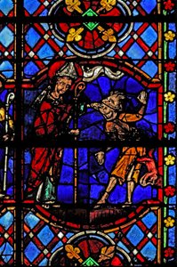Window depicting St Martin exorcises a devil
