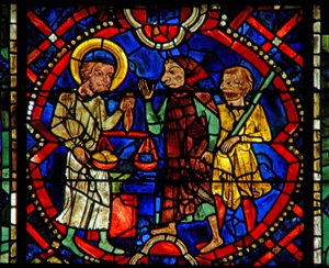 Window w107b depicting St Eloi weighing metal