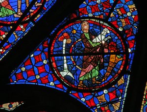 Window w115 depicting Abel brings a lamb to sacrifice