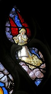 Window depicting an angelic musician