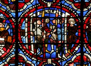 Window depicting Joshua? emerging from a city