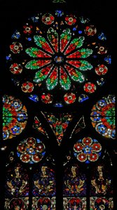 Window w18 depicting a rose with naturalistic design by French School