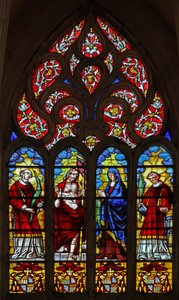 Window depicting St Stephen, Christ of the Resurrection, the Virgin Mary and a deacon saint