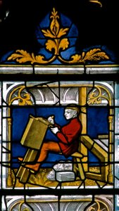 Window w25 depicting a draper at work in the Drapers window by French School