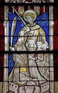 Window depicting St George with a donor and family