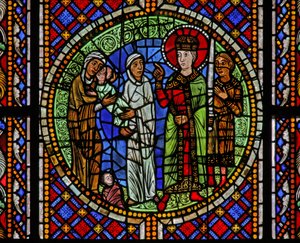 Window depicting Solomon awards the child to the real mother