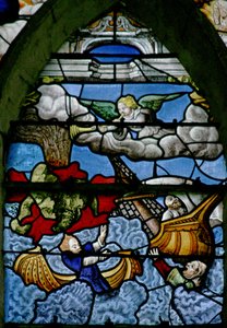 Window w5 depicting a scene from the Book of Revelation: a mountain falls into the sea; a third turned to blood