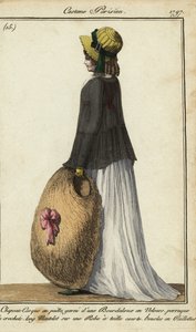 Woman in straw hat and black mantle