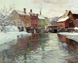Snow-covered buildings by a river