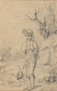 Boy standing by a cottage