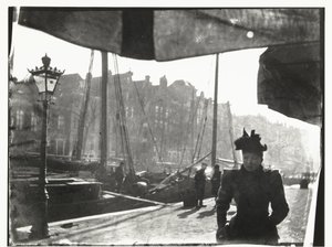 Portrait of a Woman Walking along the Prinsengracht in Amsterdam by George Hendrik Breitner
