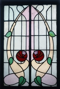 A stained glass panel depicting stylised roses