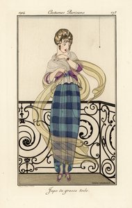 Woman in a large toile skirt, looking afraid of a spider
