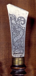Gold knife in steel and wood by German School
