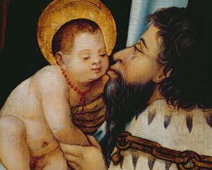 Melchior kisses the infant Jesus