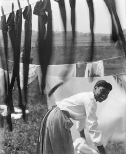 A Young African American Woman Hanging Laundry to Dry in Newport, Rhode Island, c.1902