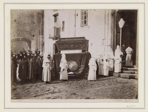 Funeral Procession of Monks with Pointed Hats at Church Entrance in Italy by Giorgio Sommer