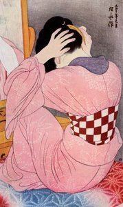 A Japanese Woman Dressing Her Hair