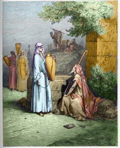 Eliezer and Rebekah - Eliezer, the servant of Abraham, is offered a drink of water by Rebekah - Eliezer and Rebecca - engraving in The Bible illustree by Gustave Dore - Engraving from The Dore Bible
