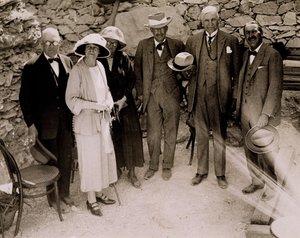 Howard Carter and a group of Europeans standing beside the excavations of the Tomb of Tutankhamun, Valley of the Kings by Harry Burton