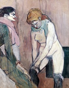 Woman pulling her stockings