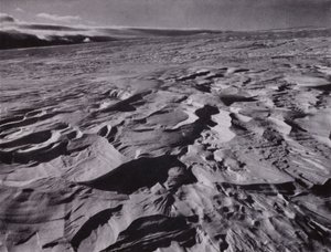 The great waves of frozen snow thrown up by the wind by Herbert Ponting