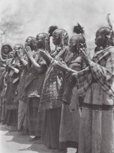 Africa: Aulad Hamid women clapping time at a dance by Hugo Adolf Bernatzik