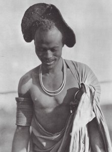 Africa: Shilluk warrior with hood coiffure by Hugo Adolf Bernatzik