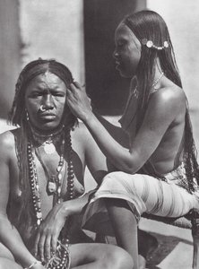 Sudanese women plaiting hair by Hugo Adolf Bernatzik