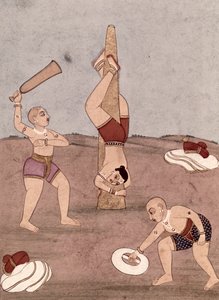 Acrobats performing physical feats