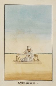 Embroiderer seated at his frame