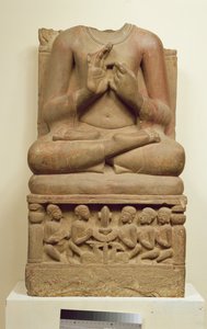 Carving of Buddha in the attitude of preaching a sermon