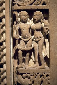 Couple of lovers. Door frame in carved stone, art of Rajasthan or Uttar Pradesh, 9th-10th century. National Museum of Korea, Seoul by Indian School