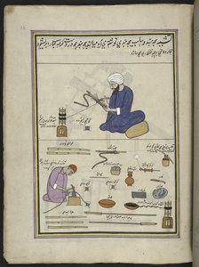 Men covering hookah-snakes with thread and wire by Indian School