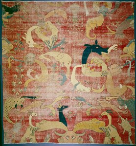 Portion of a Carpet with Fantastic Animals on Red Ground, Mughal by Indian School