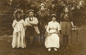 Family wearing fancy dress by Irish Photographer