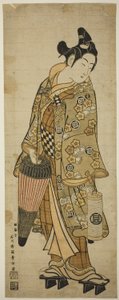The Actor Sanogawa Ichimatsu I as a young man holding an umbrella and a lantern by Ishikawa Toyonobu