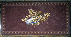 Porphyry table top with semi-precious stones mosaic, Italy by Italian School